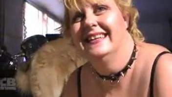 Chubby mom with huge tits blows a dog's cock