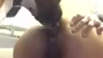 Horny lady's rear end tongued by the canine amid solo play at home