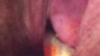 Aroused female inserts full beast cock into her pussy