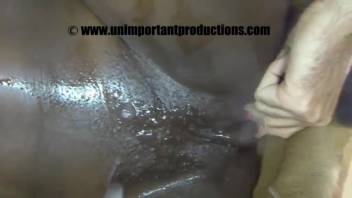 Ebony chick with untamed mane being screwed by a canine