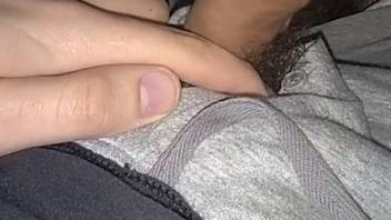 Hot female dog lapping at a man's bushy dick in a first-person view film